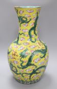 A large Chinese yellow 'dragon' bottle vase, 19th century, damaged height 50cm