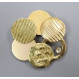 A yellow metal multiple disc brooch (tests as 18ct) set with a single diamond, gross 24.9g, 46mm.