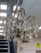 A cut glass eight branch chandelier, height 66cm