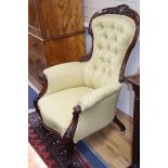 A Victorian mahogany upholstered spoon back armchair