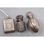 A late Victorian miniature scent flask, one other silver scent flask and a George V silver stamp