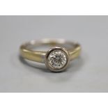 A diamond and 18ct gold solitaire ring, size M/N.