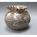 An Indian embossed white metal bowl, height 97mm.