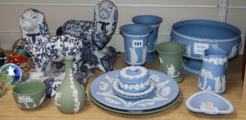 A collection of thirteen pieces of green and pale blue Wedgwood jasper pottery and a pair of ceramic