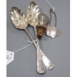 A pair of Scottish George III silver berry spoons, Edinburgh 1799 (later embossed) and two other