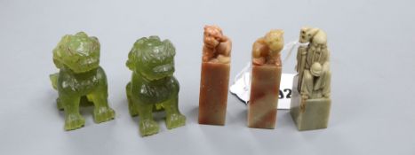 Three Chinese soapstone chop seals and a pair of hardstone Buddhist lions