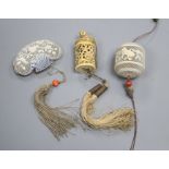 Two 19th century Chinese ivory pomanders and a similar purse