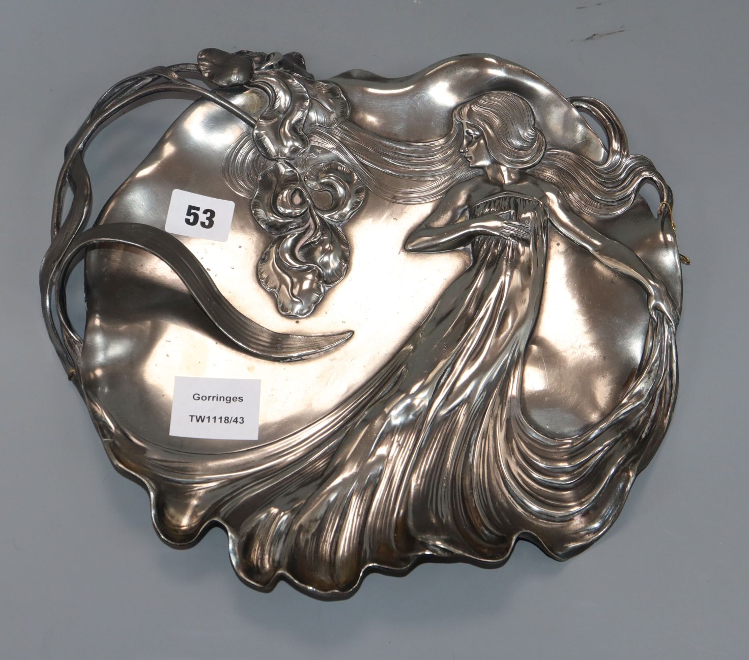 A WMF Art Nouveau pewter tray, no. 290, decorated with a maiden length 33cm