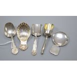 Five assorted Victorian and later silver caddy spoons, including George Unite, Birmingham, 1862.