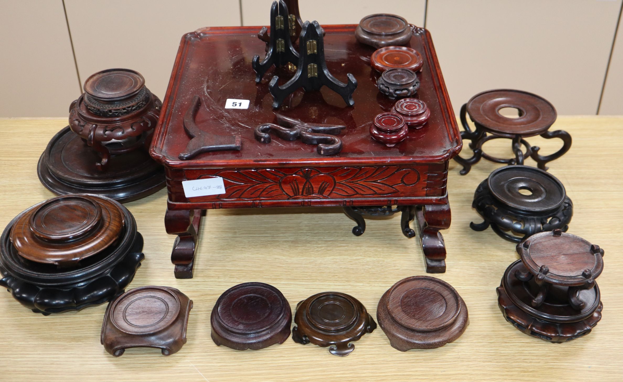 A group of Chinese and Japanese wood stands