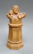A Doulton style stoneware figure of a woman in a chimney in the manner of George Tinworth,
