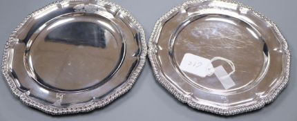 A pair of early Victorian silver plates, with gadrooned border and engraved armorial, by