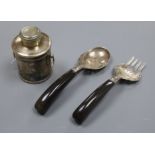 A pair of horn handled white metal servers and a plated tea caddy.