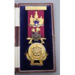 A cased 1960's 9ct gold, enamel and base metal masonic badge to H.R. Wright L.G.C.R., with