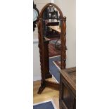 An oak cheval mirror H.144cm