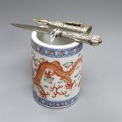 A Chinese porcelain dragon-decorated brush pot and a small gilt and white metal knife with sheath (
