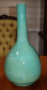 A large Chinese turquoise crackle-glazed bottle vase, incised Kangxi mark but later height 43cm