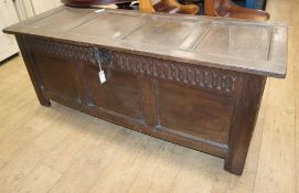 A large 18th century panelled oak coffer W.165cm