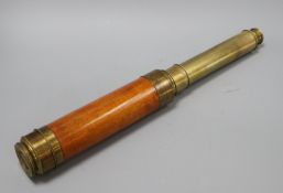 A brass three drawer telescope