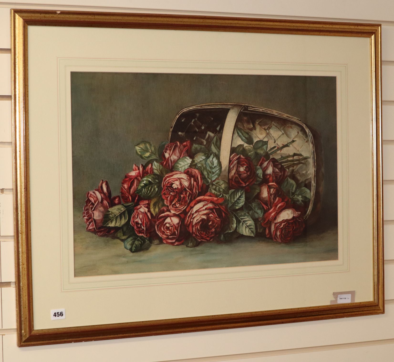 Louie Arun (?), watercolour, still life of roses in a basket, indistinctly signed and dated 1921, 44