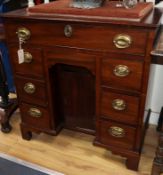 A George III mahogany kneehole desk W.76cm