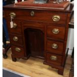 A George III mahogany kneehole desk W.76cm