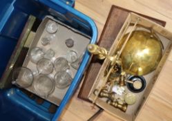 A group of pill making machines, brass balance scales and chemist's measures