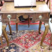 A walnut side table / lowboy, 18th century and later, on cabriole legs W.68cm