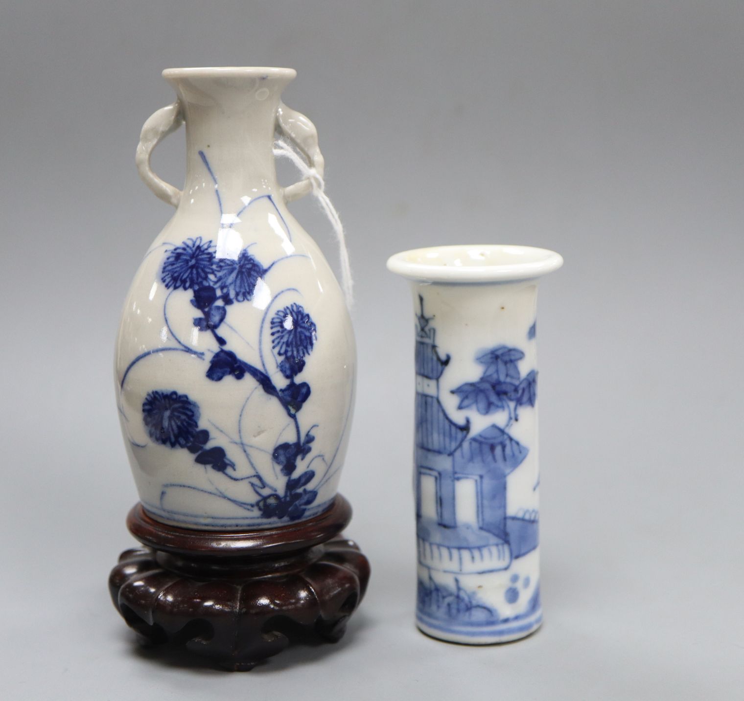 A 19th century Chinese blue and white 'Hu' vase and a similar miniature sleeve vase, and a
