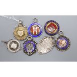 Six assorted early 20th century and later silver fob medals including enamel and football related