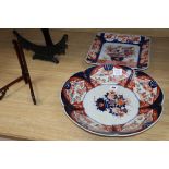 Two large Japanese Imari dishes and two stands largest diameter 40cm