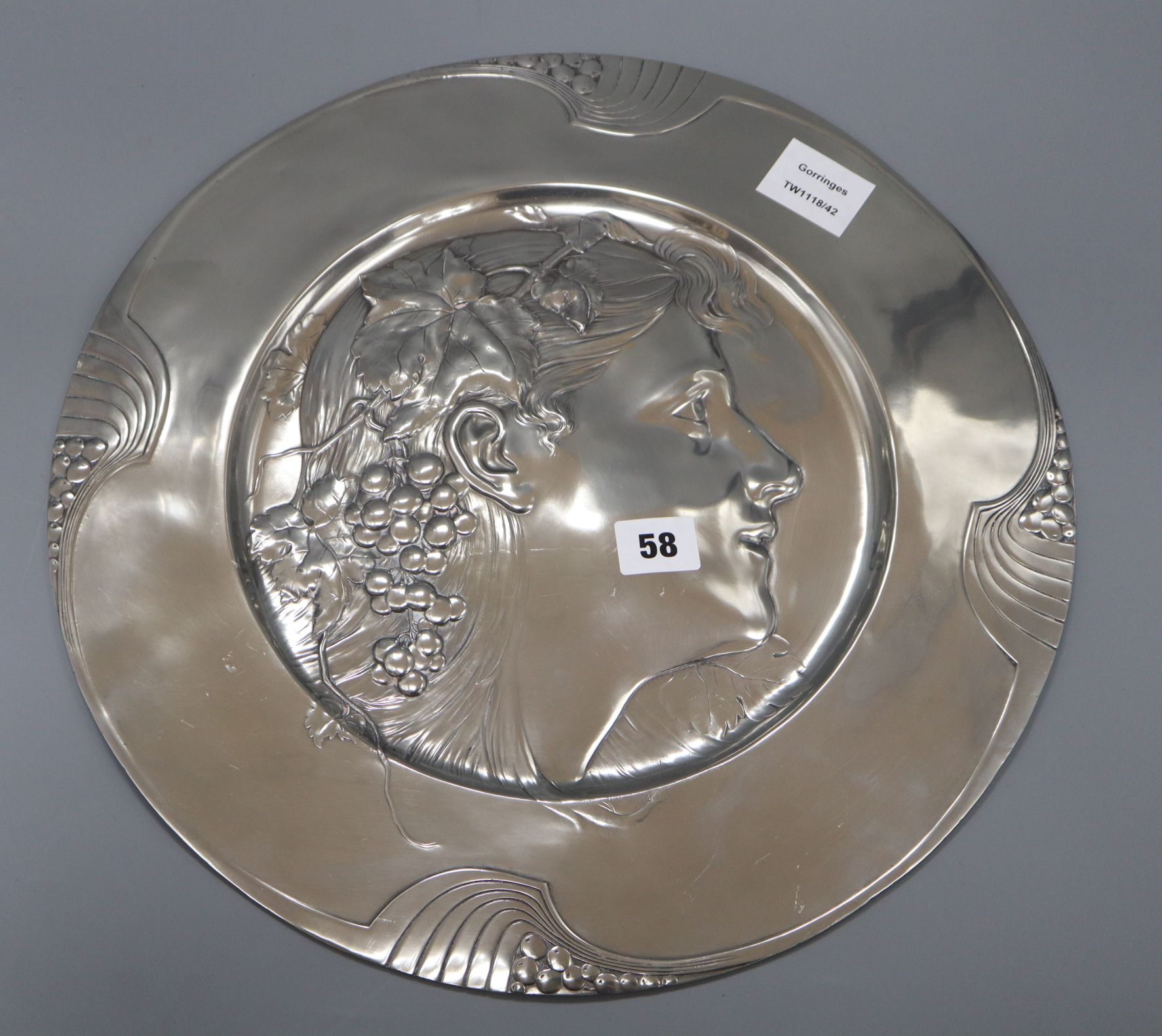 An AK & Cie Art Nouveau pewter Bacchante dish diameter 40cm