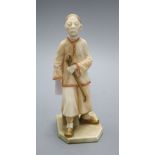 A Royal Worcester blush ivory figure of a Chinaman height 17cm