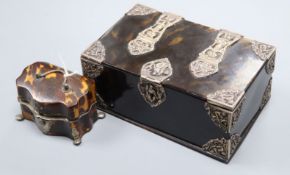 A 19th century white metal mounted tortoiseshell travelling writing set casket and a white metal