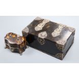 A 19th century white metal mounted tortoiseshell travelling writing set casket and a white metal