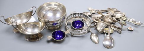 A mixed group of assorted silver including flatware, a sugar bowl and two pairs of salts,