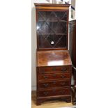 A George III style mahogany bureau bookcase of narrow proportions W.66cm