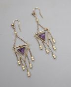 A pair of early 20th century yellow metal, amethyst and seed pearl set drop earrings and two 9ct ear