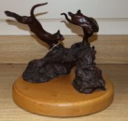 Marcus Cornish (Modern British). A bronze of two cats, on oak plinth height 28cm