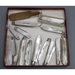 Fifteen assorted Victorian and later mother of pearl handled silver fruit knives.