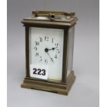 An Edwardian brass carriage timepiece