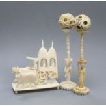 Two Chinese ivory puzzle balls and stands and an Indian ivory carriage group