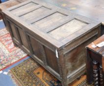 An 18th century oak panelled coffer W.134cm