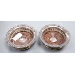 A pair of modern pierced silver wine coasters, Barker Ellis Silver Co, Birmingham, 1990, 14.6cm.