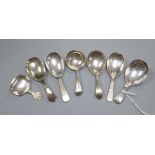Seven assorted 19th century and later silver caddy spoons including Robert Hennell II?, London,