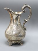 A Victorian engraved silver pear shaped cream jug, William Smily, London, 1856, 17cm, 7.5 oz.