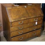 An 18th century style walnut bureau W.98cm