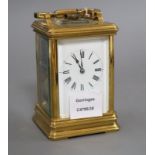 A late 19th century French eight day striking carriage clock