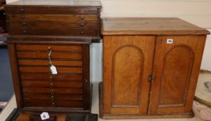 Three cabinets containing Indian stupa