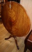 A late George III mahogany circular tilt top tea table Diameter 86cm